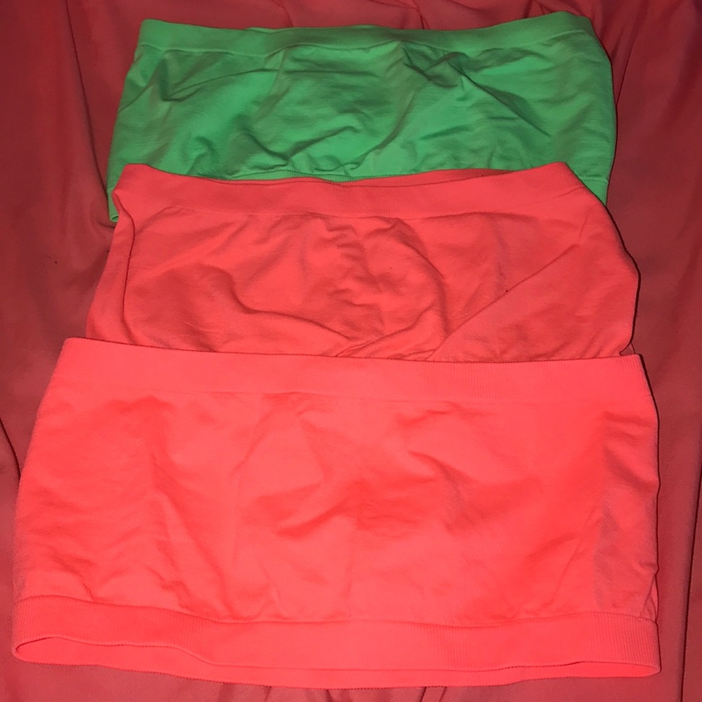 strapless bras. in neon green and pink.
